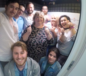 VTO staff celebrating in our recording booth