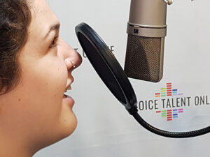 Voice Talent Online employee talking into microphone