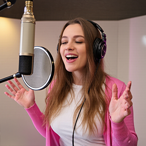 Picture of a female British voice talent in the voice over booth.