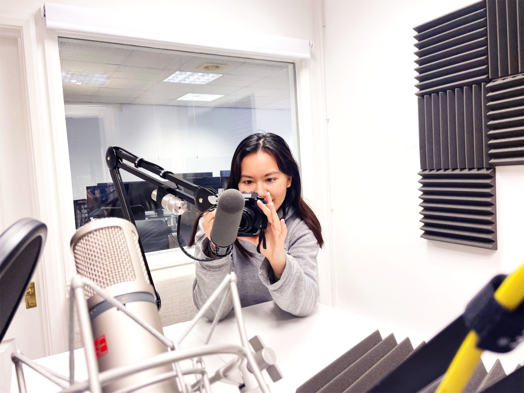 Agnes, VTO employee takes a photograph in the sound room.